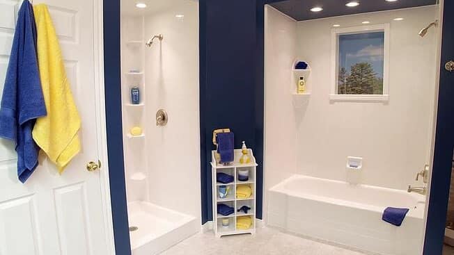 White blue and yellow simple bathroom interior with shower and small vanity cabinet